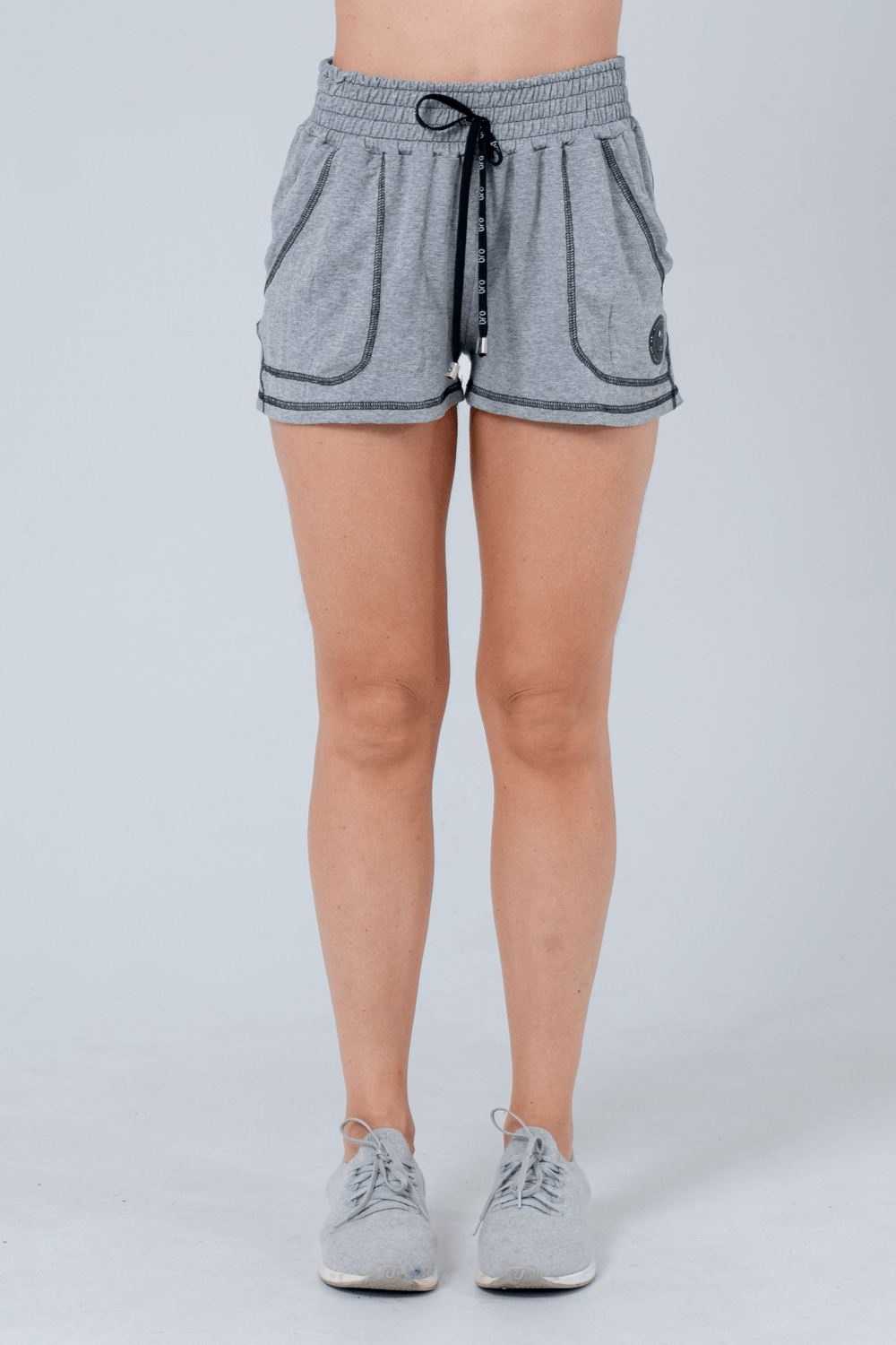 SHORT FITNESS BRUMA CINZA MESCLA CLARO